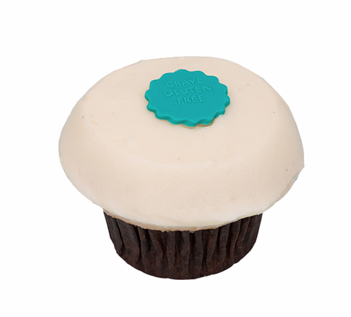 We bake our cupcakes fresh daily. (Shown: Gluten Free Vanilla on Vanilla cupcakes.)