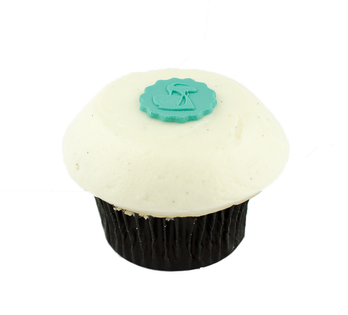 We bake our cupcakes fresh daily. (Shown: Vanilla Cupcake  cupcakes.)